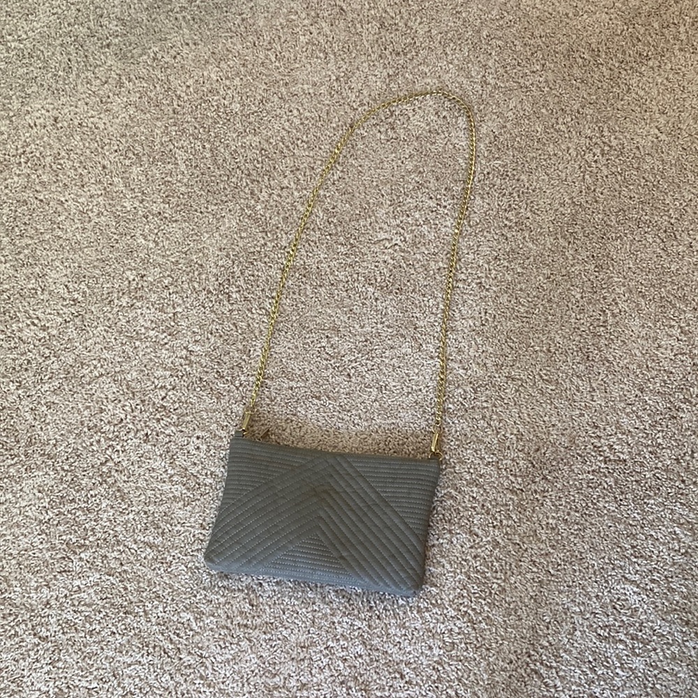 Grey purse with gold chain